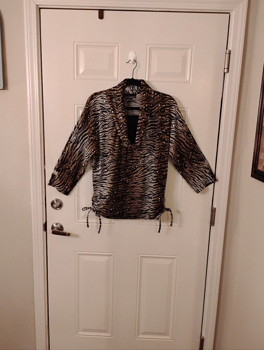 Isabella Rodriguez Animal Print Top With Sequin Embellishments.